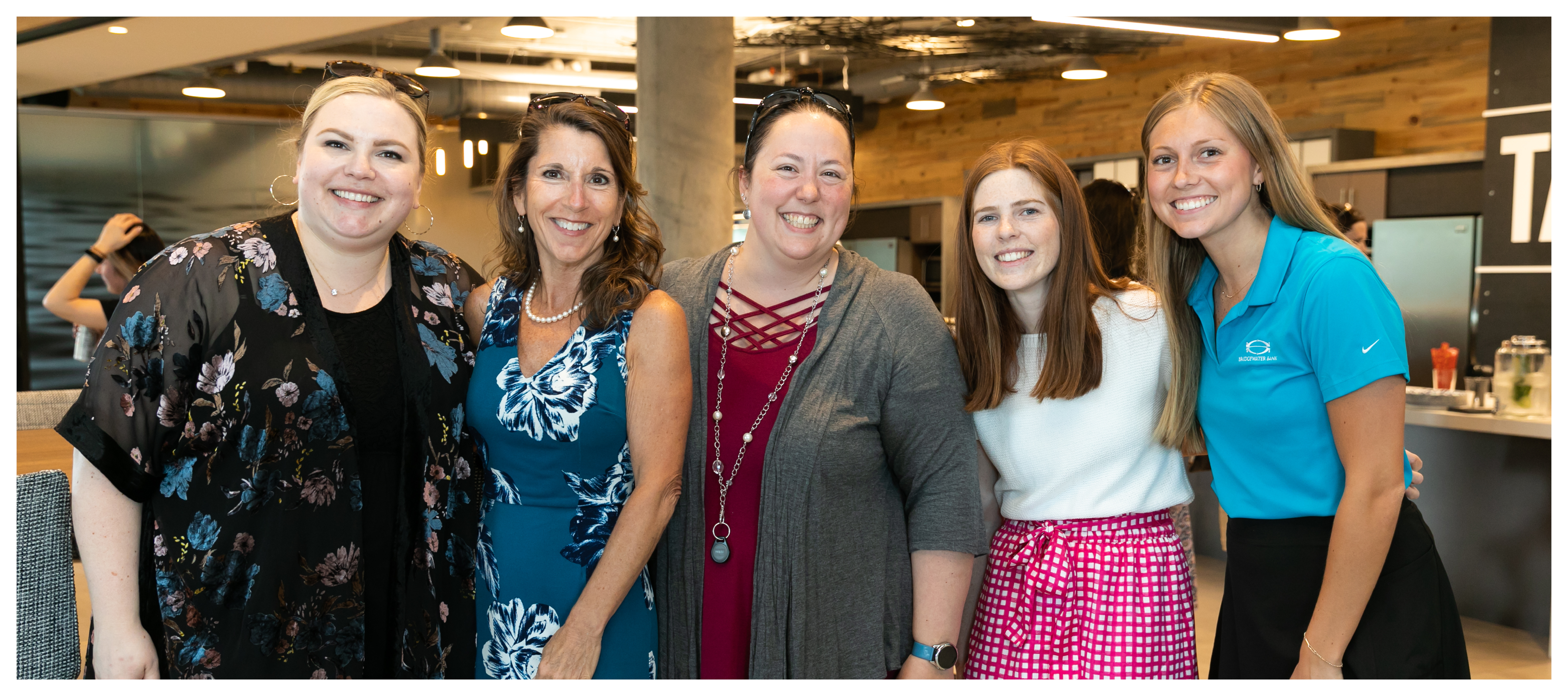 Group photo of Prestige Trust Capital women at an internal happy hour.